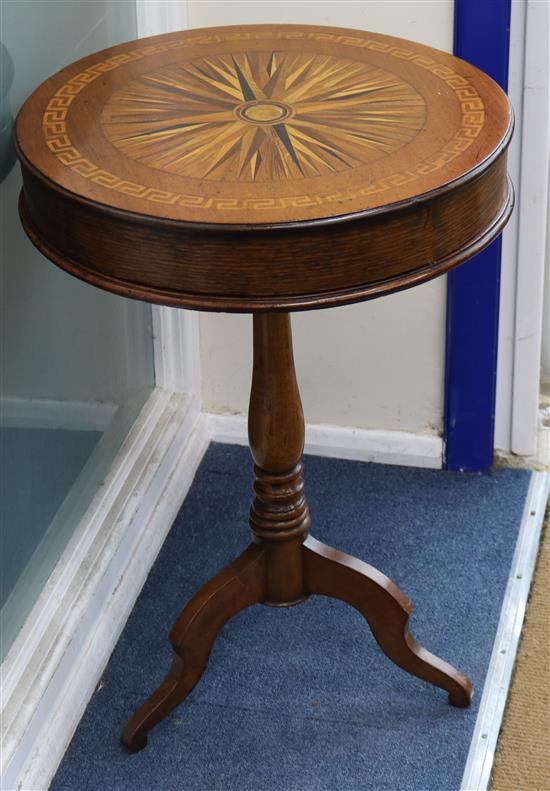 An inliad oak drum table W.53cm